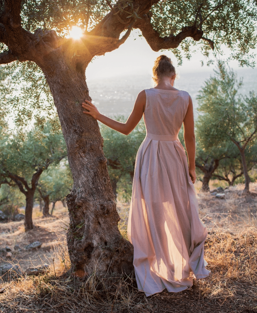 Woman by a Tree at Sunset